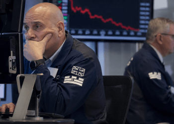 UK shares slip as earnings weigh ahead of central bank decisions
